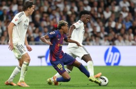 Vinicius Junior and Lamine Yamal fight for the ball during last weekend's Clasico, in which Real Madrid beat Barcelona 2-1