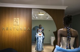 A model tries on an outfit from Nigerian brand Hertunba during a fitting session in Lagos