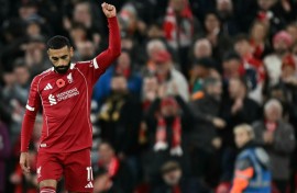 Liverpool's Mohamed Salah celebrates scoring against Aston Villa