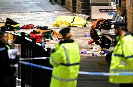 Paramedics medical equipment is pictured inside a police cordon at Huntingdon Station in eastern England