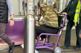 Lindsay Sandiford is wheeled out of Heathrow airport after landing at Terminal 4 as part of a repatriation agreement between Indonesia and the UK