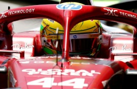 Lewis Hamilton stops in the pits in Sao Paulo during another say of Ferrari struggles