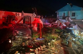 The twister overturned cars and damaged homes in Rio Bonito do Iguacu, in Brazil's Parana state, according to the local weather service