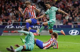 Atletico Madrid forward Antoine Griezmann came off the bench and scored twice as his side beat Levante