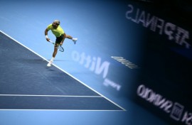 Carlos Alcaraz beat Alex De Minaur in the opening match at the ATP Finals tennis tournament in Turin