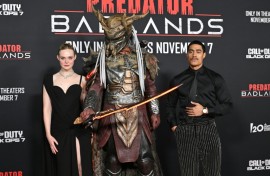 US actress Elle Fanning (L) and New Zealand actor Dimitrius Schuster-Koloamatangi star in 'Predator: Badlands'