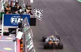 Lando Norris takes the chequered flag at Interlagos to move 24 points clear in the driver's title battle