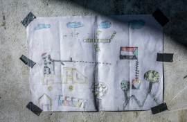 A drawing created by a young Sudanese refugee is at the Tine transit camp in Chad