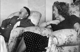 This undated and unlocated picture shows Hitler relaxing with his mistress Eva Braun