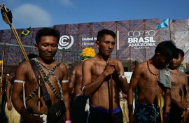 Members of the Indigenous movement Munduruku Ipereg Ayu hold a protest outside the United Nations climate summit venue in Belem, Brazil