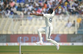 Jasprit Bumrah runs in to bowl on the first day against South Africa in Kolkata