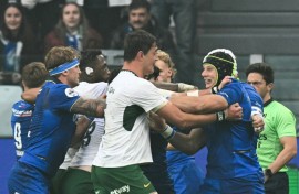South Afria lock (C) Franco Mostert grapples with Italy flanker Ross Vintcent during last Saturday's game