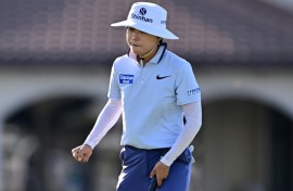 South Korea's Lee So-mi reacts after making an eagle putt on the 17th hole to help grab the lead after the opening round of the LPGA Tour Championship