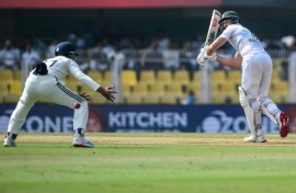 South Africa's Aiden Markram (R) plays a shot during the first day of the second Test