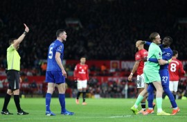 Everton's Idrissa Gueye (second right) is sent off at Old Trafford following an altercation with teammate Michael Keane