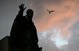 A statue of Pope Benedict XV outside Istanbul's Cathedral of the Holy Spirit where Leo attends prayers on Friday