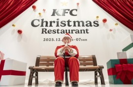 A statue of Colonel Sanders dressed as Santa Claus is displayed at the KFC Christmas restaurant in Tokyo