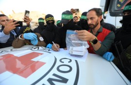 Palestinian militants hand the remains over to the Red Cross which then passes them on to Israeli forces