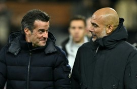 Fulham manager Marco Silva (left) speaks with Manchester City boss Pep Guardiola at Craven Cottage