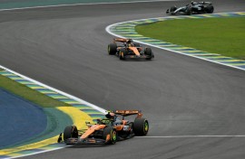 McLaren's Lando Norris (bottom) and Oscar Piastri have duelled all season for the world championship title
