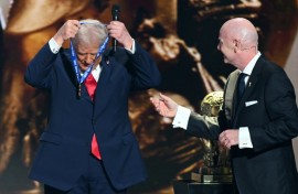 US President Donald Trump receives the FIFA Peace Prize from FIFA chief Gianni Infantino