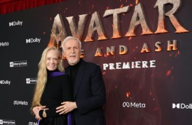 Canadian director James Cameron and his wife, US actress Suzy Amis Cameron, attend the premiere of "Avatar: Fire and Ash" in Hollywood on December 1