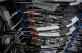 A cabinet holding racks and active servers