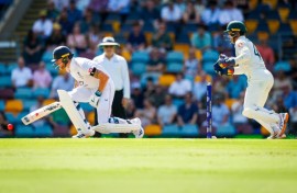 England's Ben Stokes reacts after being struck by the ball during day four