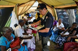 The 31-member medical aid team from Japan set up a clinic in white tents, equipped with their own medical kits and power generators