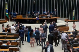 Government-allied leftist deputy Glauber Braga was forcibly removed by police officers after occupying the Speaker's chair