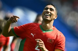 Achraf Hakimi celebrates scoring for Morocco at the 2024 Olympic Games in Paris