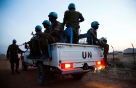 Peacekeeper troops from Ethiopia, deployed as part of the United Nations Interim Security Force for Abyei (UNISFA), patrol in a UN vehicle at night in Abyei town, Abyei state, on December 14, 2016