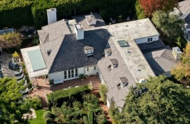 A Los Angeles Police Department patrol car behind police tape in the Brentwood neighborhood of Los Angeles, California