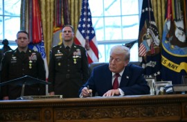 US President Donald Trump signs an executive order on fentanyl in the Oval Office on December 15, 2025