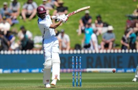 Roston Chase plays a shot during day the second Test