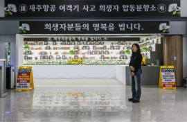 Grieving mother Lee Hyo-eun returns every weekend to the airport where her daughter and 178 others died last year