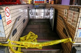 This picture taken and released by Taiwan's Central News Agency (CNA) shows one of the entrances to Taipei Main Station being cordoned off after an attack