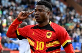 Gelson Dala celebrates scoring for Angola against Zimbabwe in Marrakesh.