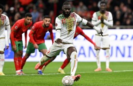 Lassine Sinayoko scores from the penalty spot for Mali against Morocco in Friday's Africa Cup of Nations clash