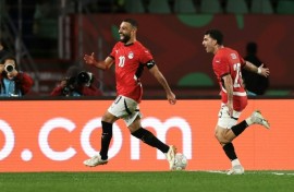 Egypt captain Mohamed Salah (L) celebrates after scoring the goal that clinched a 3-1 AFCON victory over Benin in Agadir