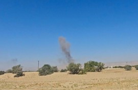 An image grab from AFPTV footage shows smoke billowing after airstrikes that killed seven people in Yemen