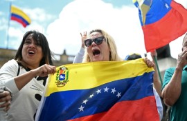 People celebrate in Bogota after US forces captured Venezuelan leader Nicolas Maduro in Caracas