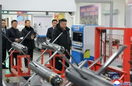 This picture taken on January 3, 2026 and released by North Korea's official Korean Central News Agency (KCNA) via KNS on January 4, 2026 shows North Korean leader Kim Jong Un visiting a factory involved in making tactical guided weapons, at an undisclosed place in North Korea