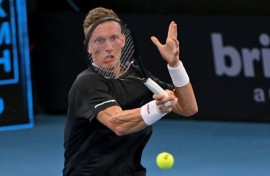 Jiri Lehecka hits a return to fellow Czech Tomas Machac in Brisbane