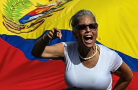 A woman shouts slogans during a rally in support of ousted Venezuelan leader Nicolas Maduro and his wife Cilia Flores in Caracas