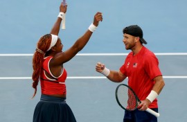 Coco Gauff and Christian Harrison celebrate defeating Greece’s Maria Sakkari and Stefanos Tsitsipas