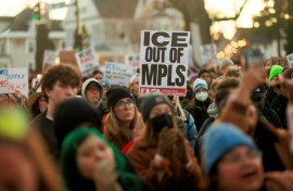 Thousands of protesters took to the frigid streets of Minneapolis after the shooting, holding signs reading 'ICE out of MPLS,' a common abbreviation for the city