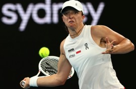 Poland’s Iga Swiatek hits a return to Australia’s Maya Joint