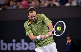 Daniil Medvedev hits a return during his men's singles final against Brandon Nakashima at the Brisbane International