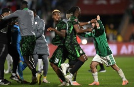 Tensions spilled over at the end of Saturday's Africa Cup of Nations quarter-final between Algeria and Nigeria, which the Super Eagles won 2-0 in Marrakesh
